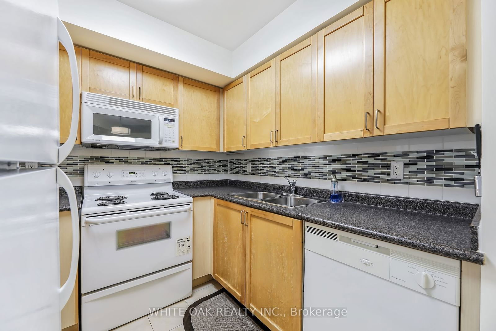 30 Harrison Garden Blvd, unit 206 for sale