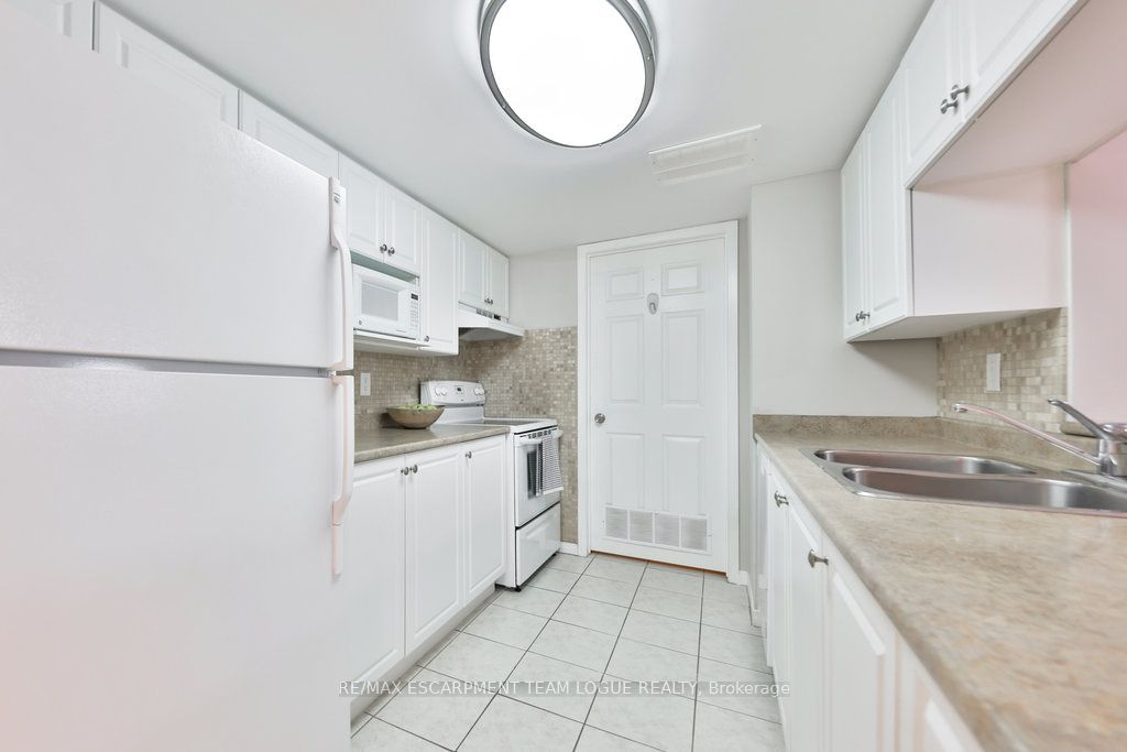 216 PLAINS Rd W, unit B406 for sale - image #4